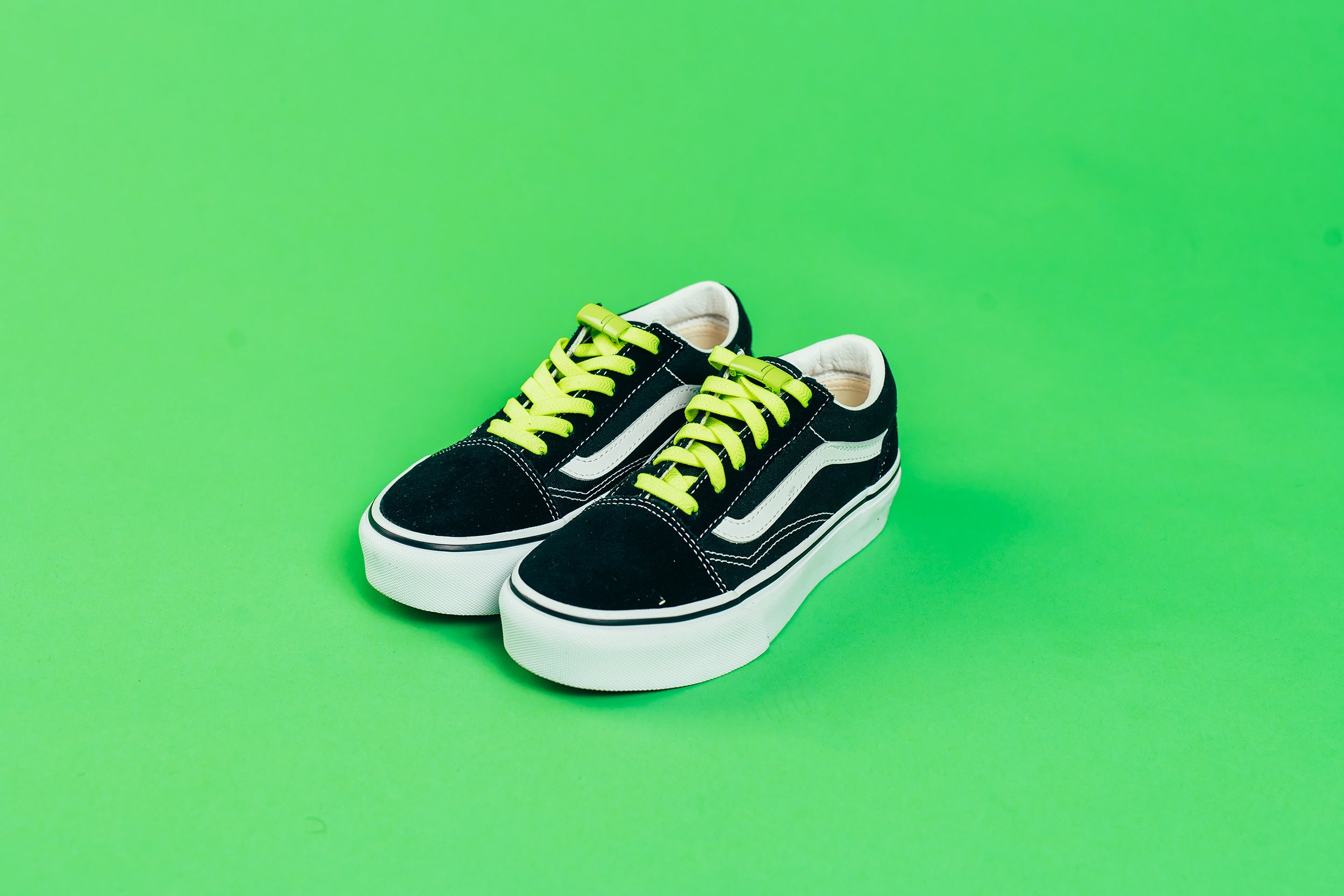 Black vans with yellow laces shops